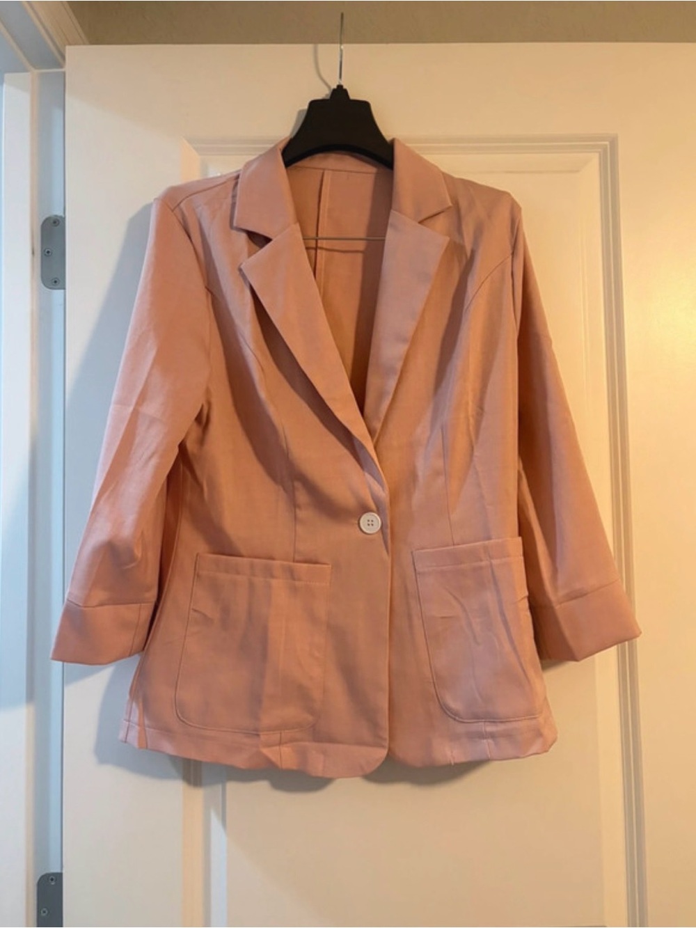 NWOT Temu size S baby pink 3/4 sleeve light blazer.  Never worn.  No lining